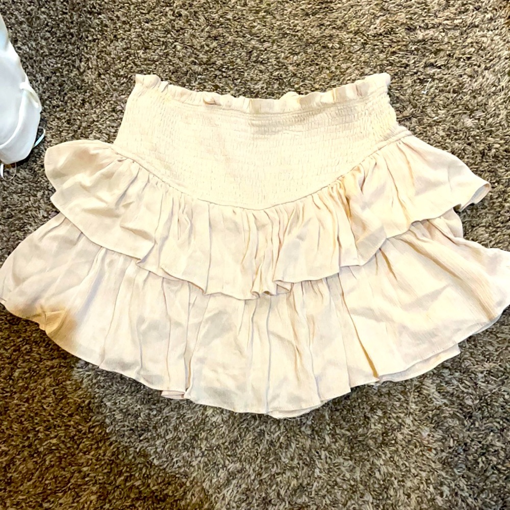 Vestique mini skirt. Size M, cream.